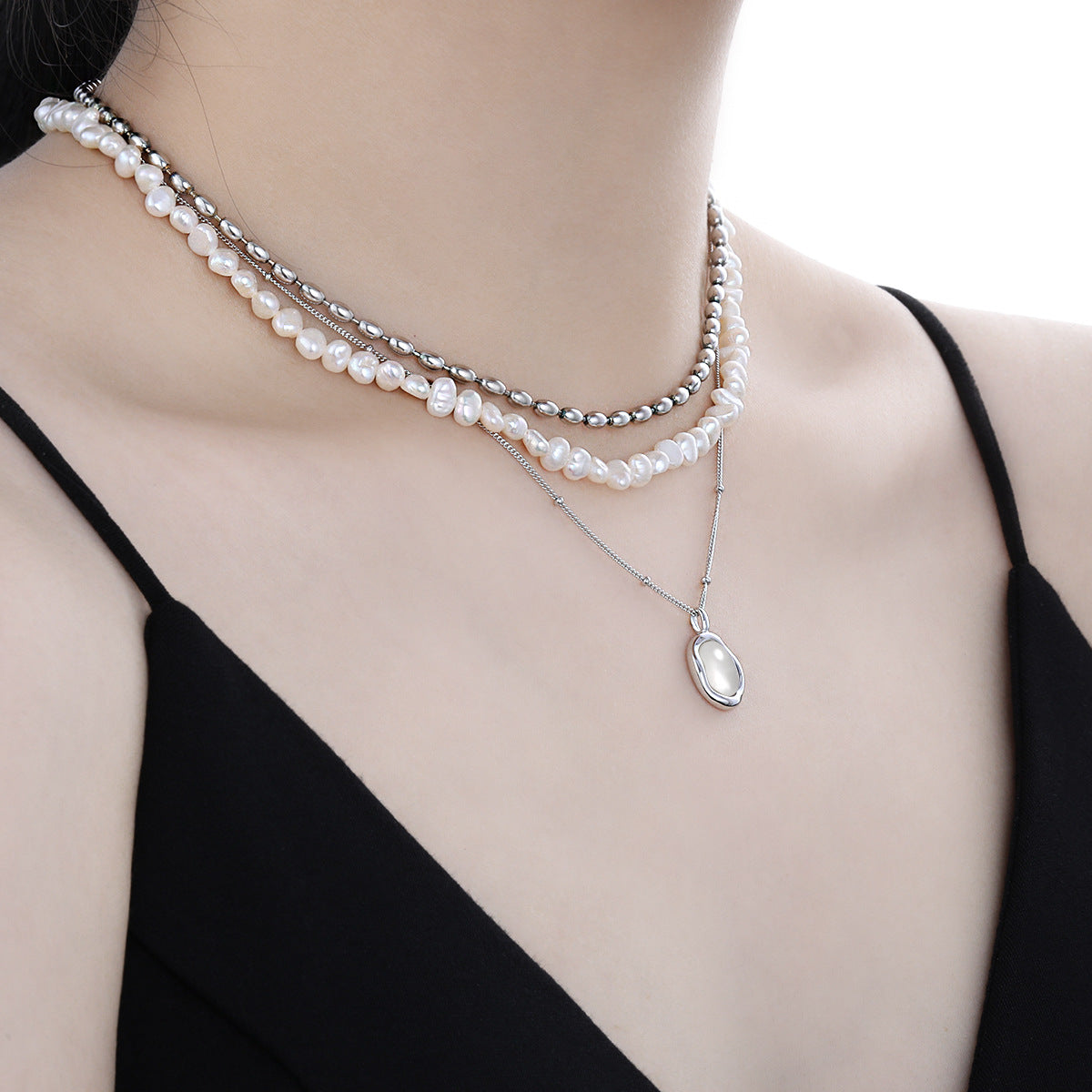 "Nivora" - Damen Halskette mit einfachem ovalem Anhänger aus natürlicher, weißer Muschel und 925er Sterlingsilber