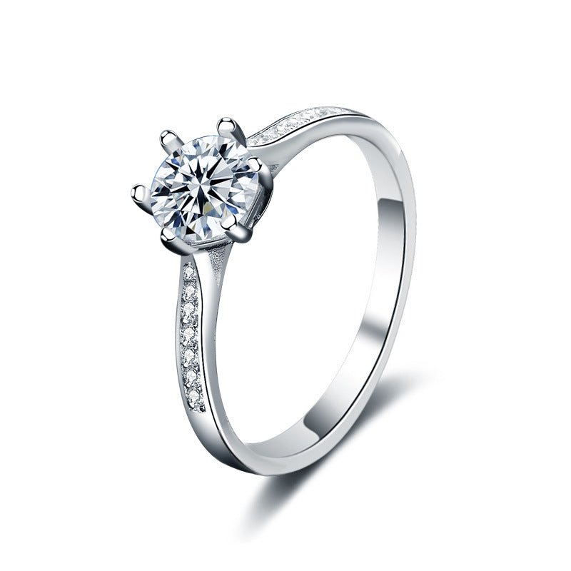 "Nayora" - Eleganter Ring aus 925er Sterlingsilber mit Moissanit-Zirkonia im Kronen-Design und sechs Krappen